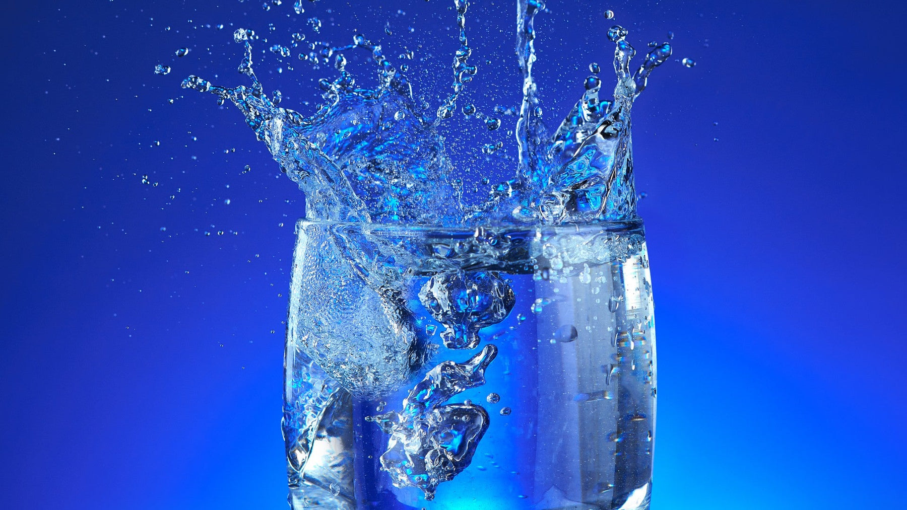 Glass of water for staying hydrated and curbing food cravings