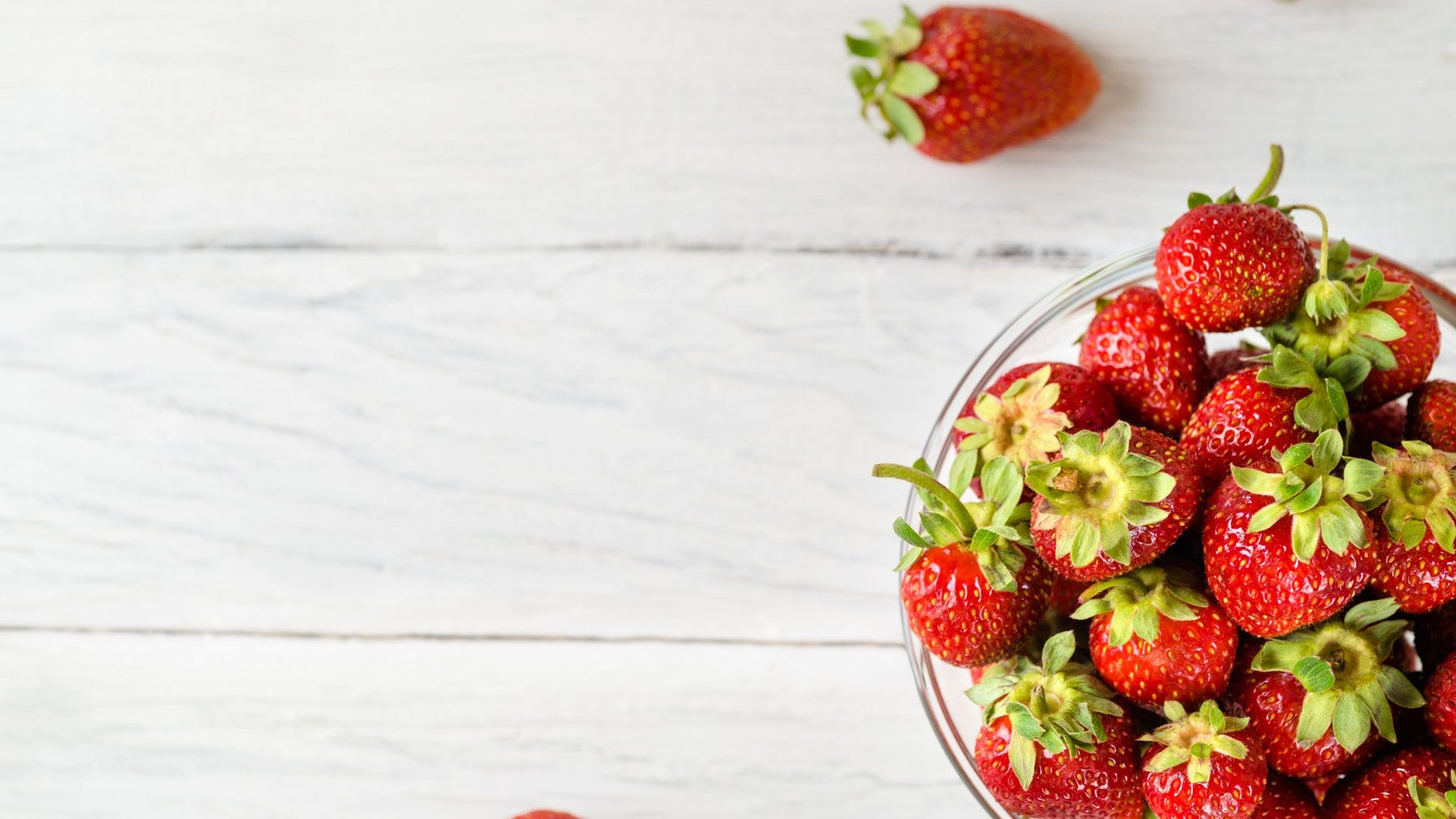 Fresh strawberries showing their calorie count