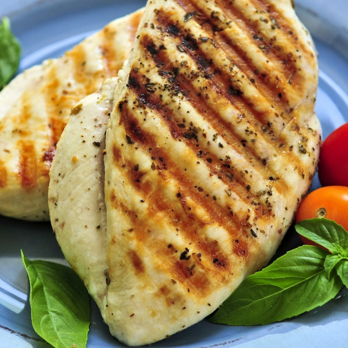Grilled chicken breast showing its calorie count