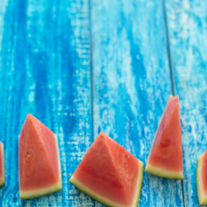 Sliced watermelon showing its calorie count