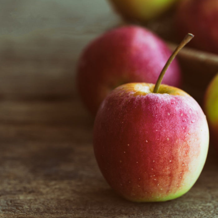 Fresh apple showing its calorie count