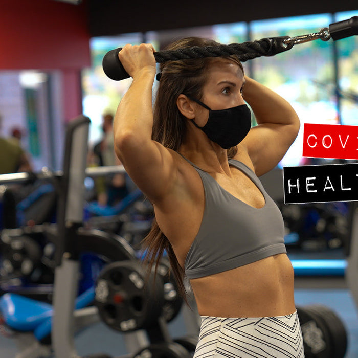 Person training in a mask during the COVID pandemic