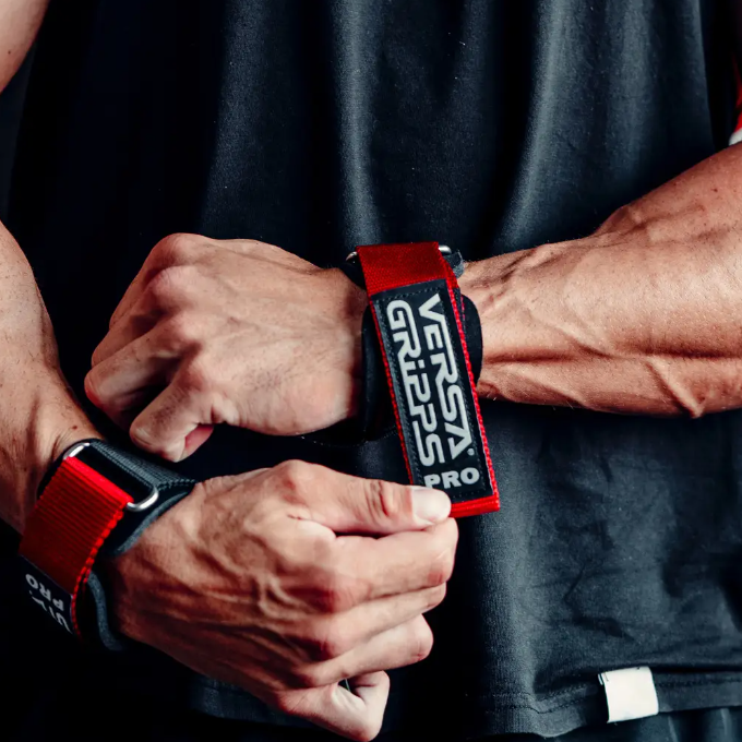Athlete using Versa Gripps lifting straps during a workout