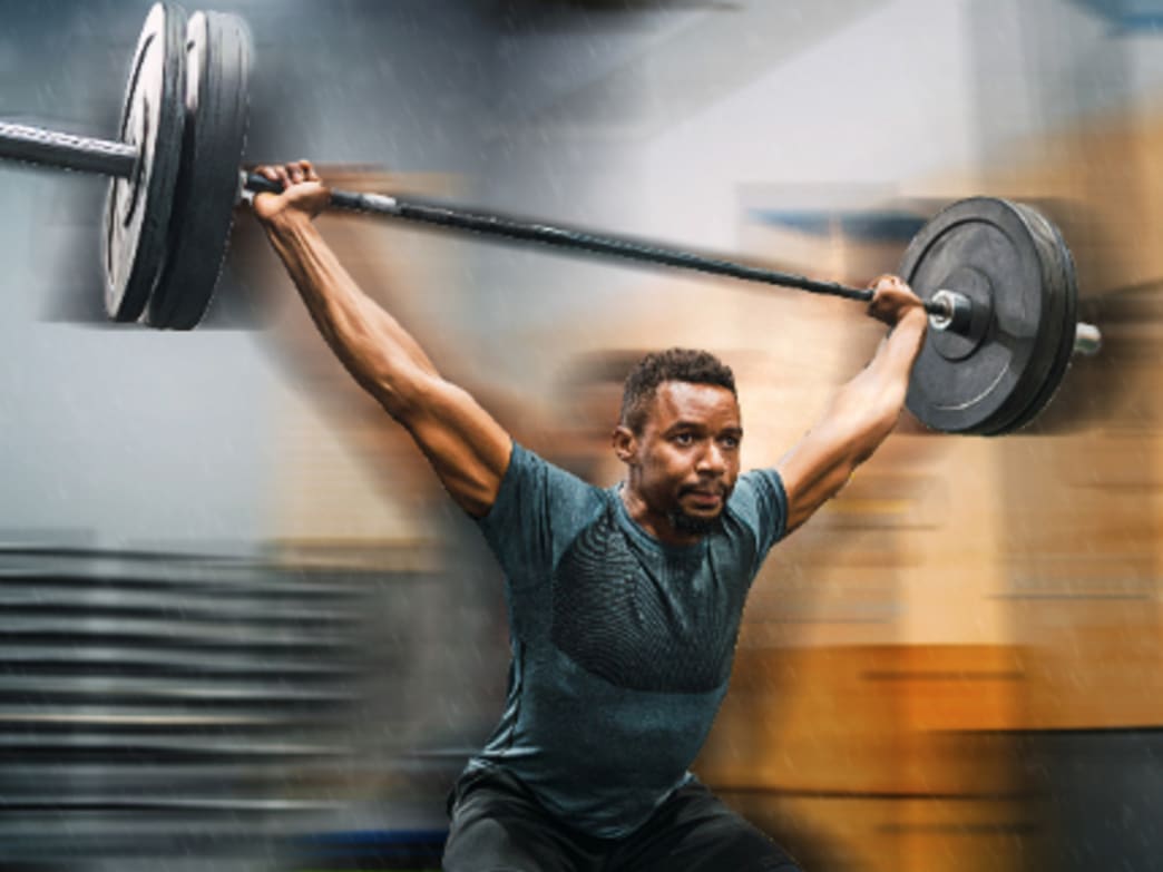 Group CrossFit training session in a gym