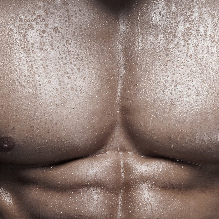 Confident man illustrating tips for awakening your alpha male