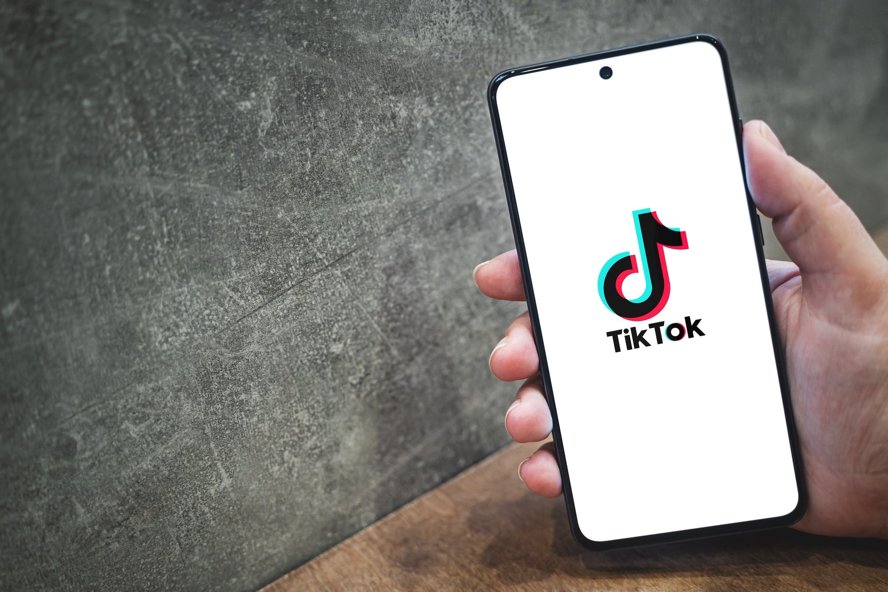 TikTok app logo displayed on a smartphone screen