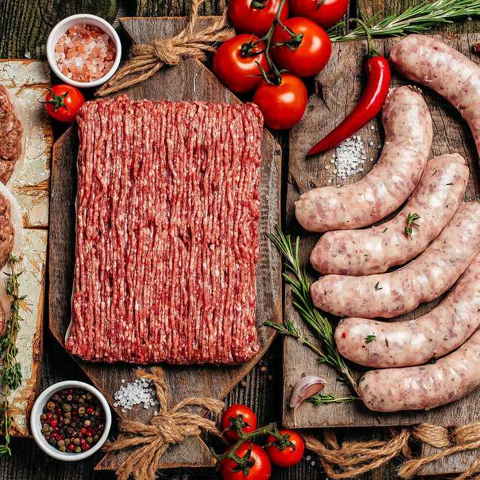 Grilled meats comparing fake meat to real meat health claims