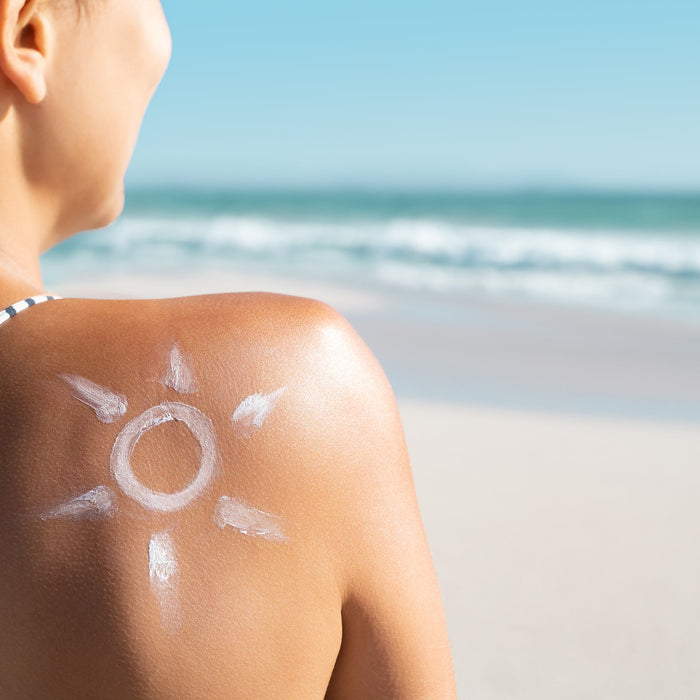 Woman enjoying summer sun exposure outdoors