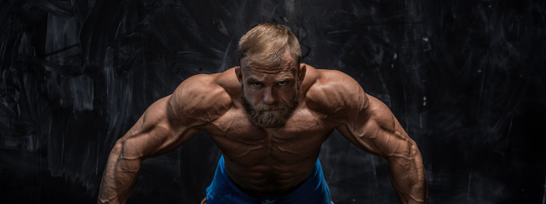 Athlete bulking illustrating mental toughness and physical strength