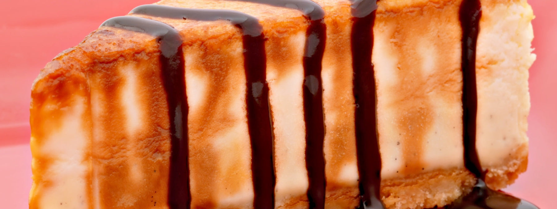 Slice of high protein caramel cake with chocolate cream cheese filling