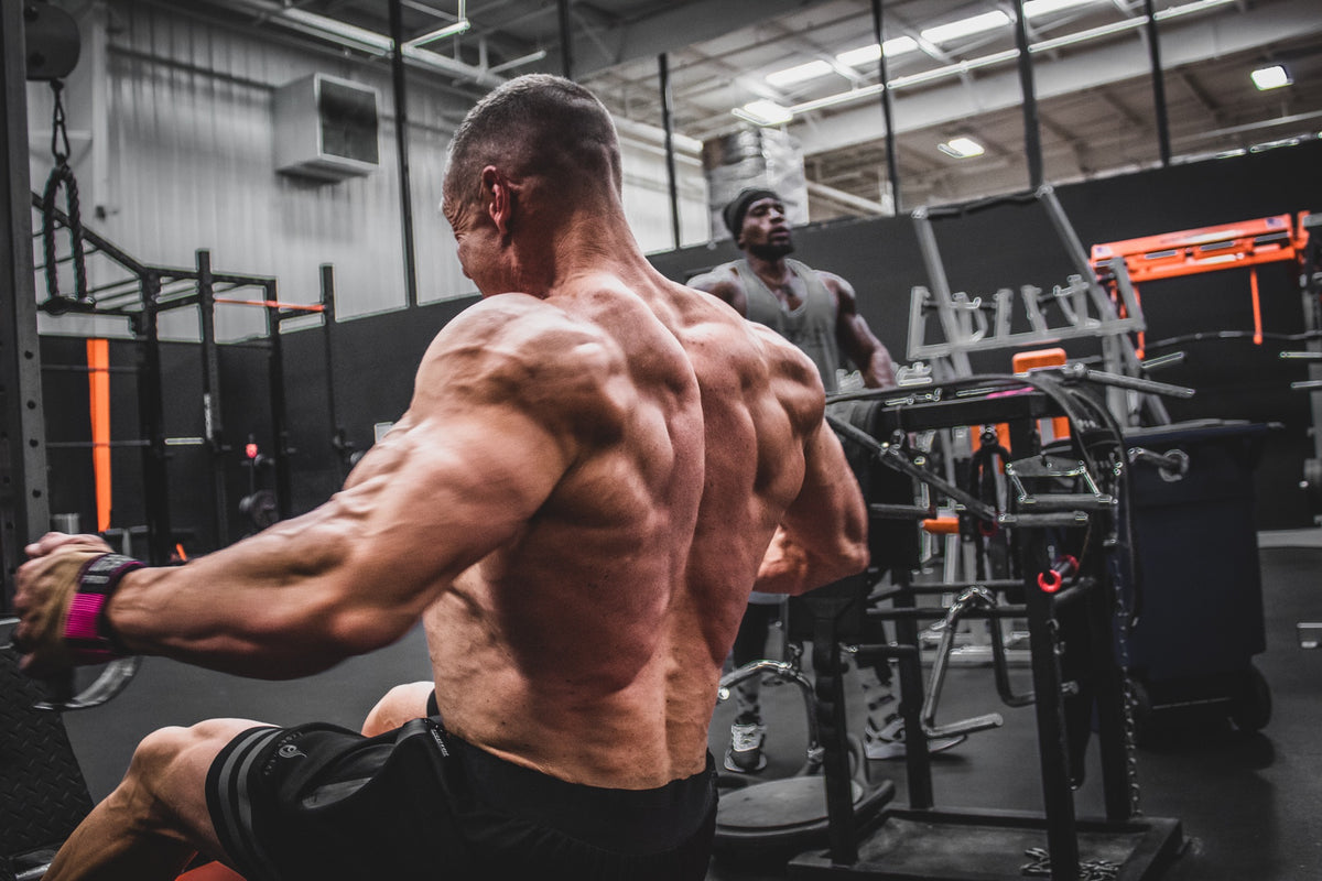 Marc Lobliner performing a wide grip lat pulldown, the anchor pull movement in this short four day push pull gym workout