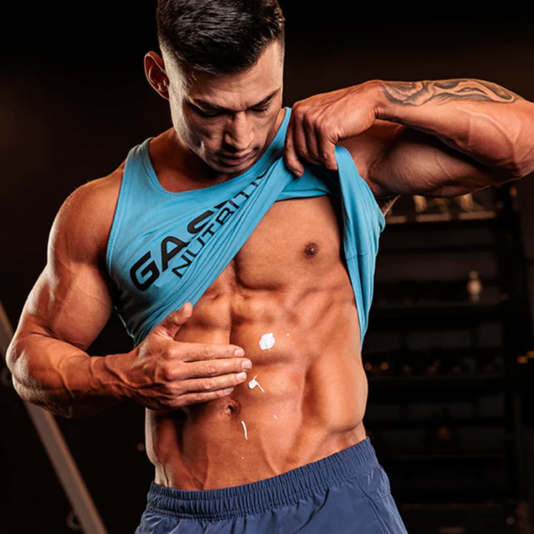 A lean, conditioned male athlete photographed front on in the gym, the kind of build a full twelve week block produces.