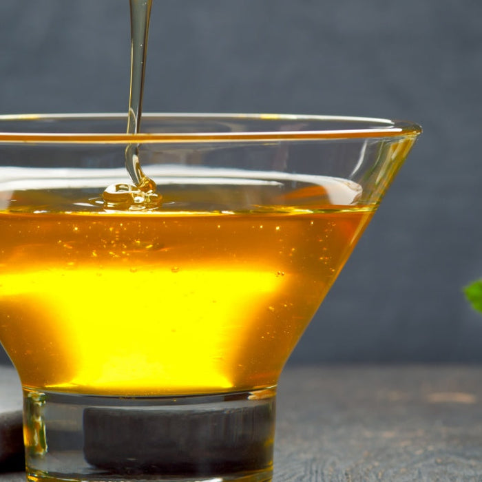 Jar of Manuka honey and its history and uses