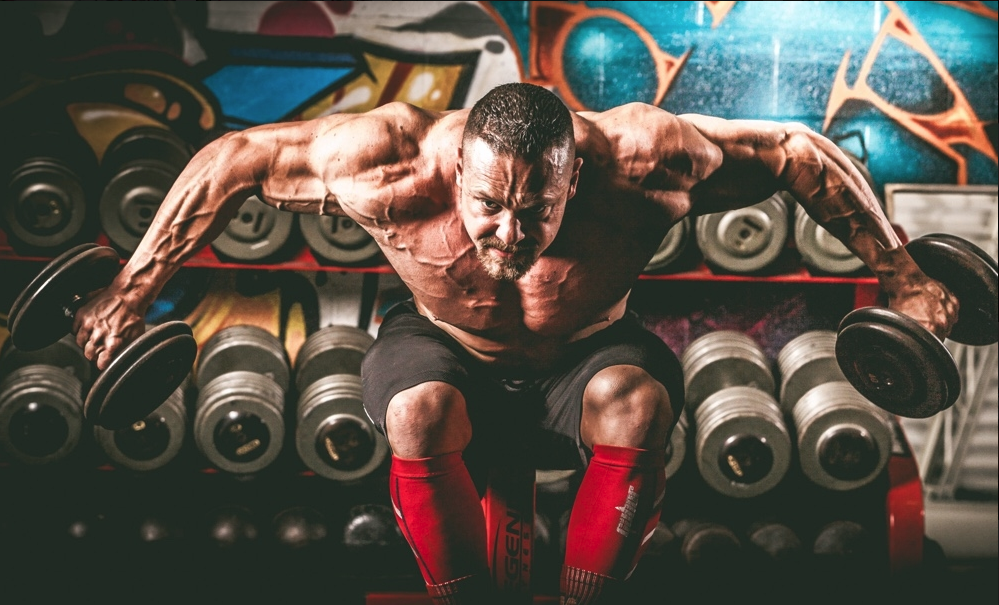 Marc Lobliner performing a deltoid shoulder workout exercise