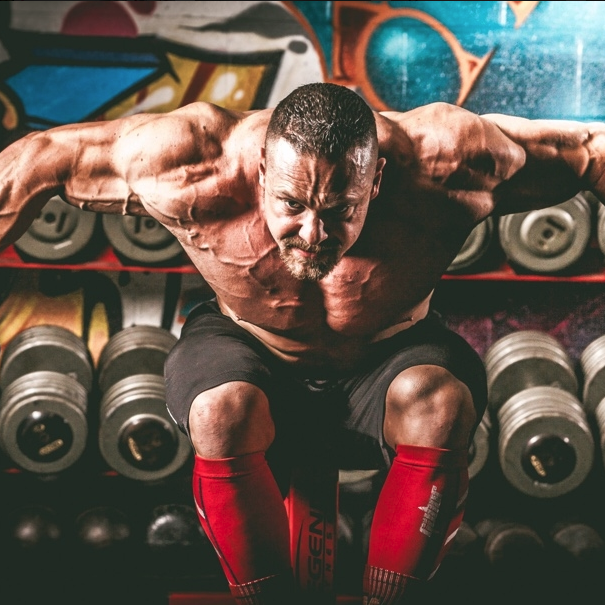 Marc Lobliner performing a deltoid shoulder workout exercise