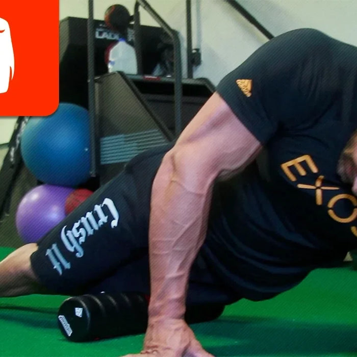 Athlete performing pillar and movement prep before a workout