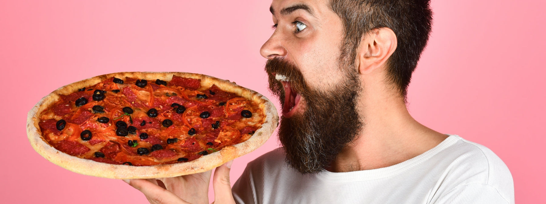 Slice of pizza illustrating what a dirty bulk diet looks like