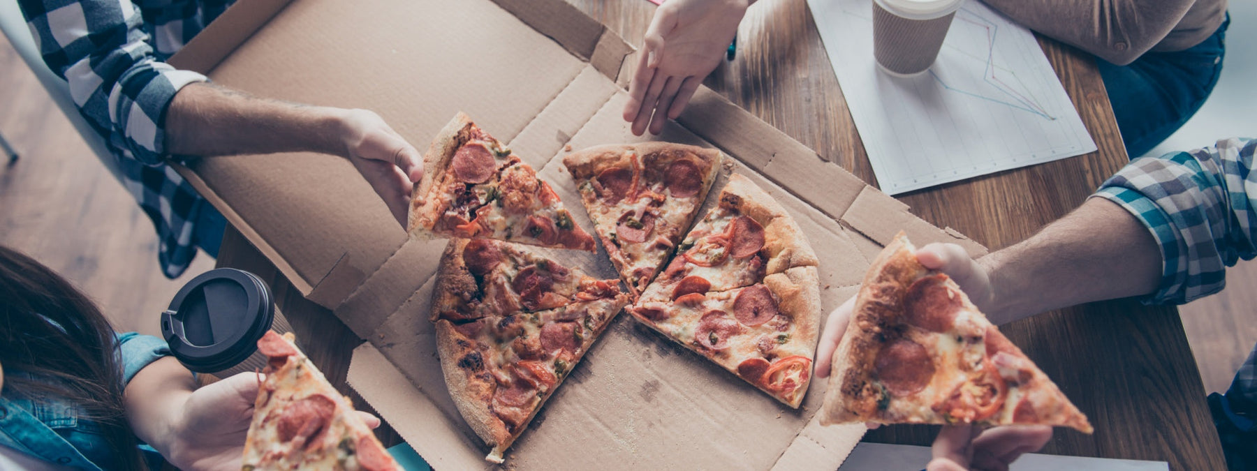 Slice of pizza representing a cheat meal in a flexible diet