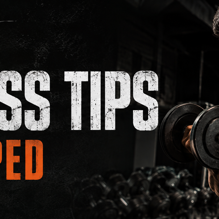 Muscular athlete training with dumbbells beside the headline 4 Fat Loss Tips – Get Ripped