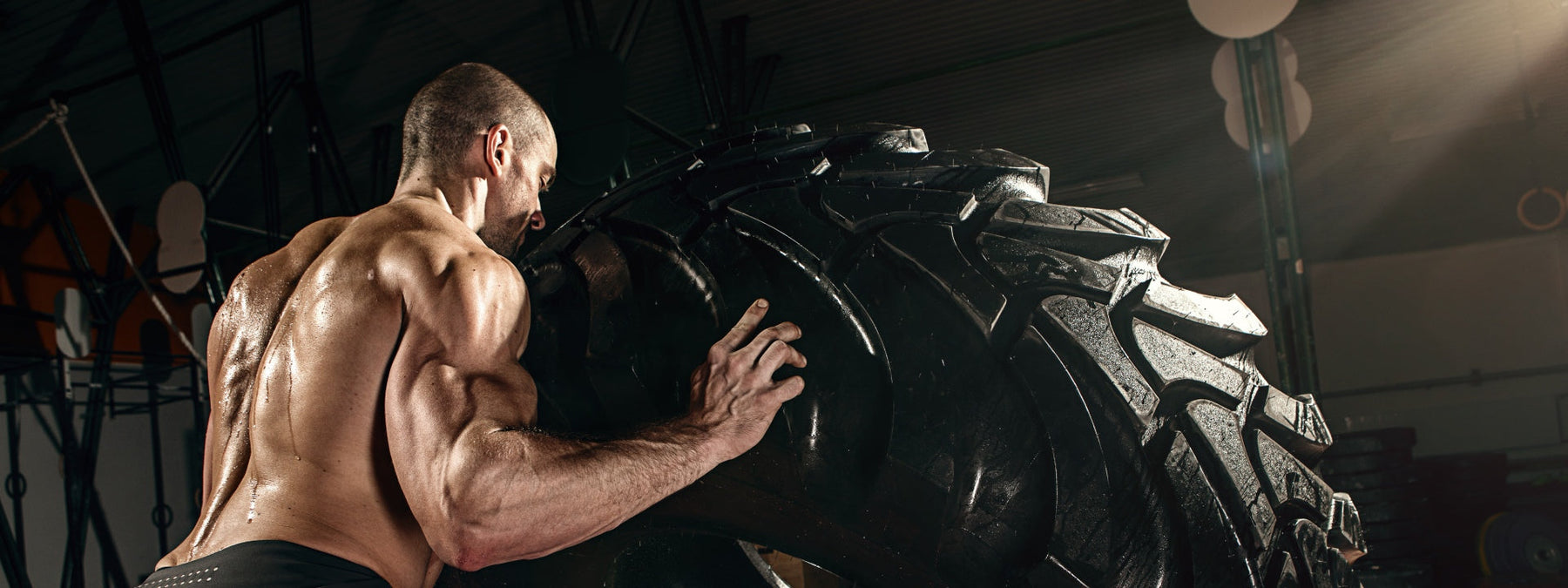 Athlete pulling a tire illustrating that talent is overrated