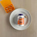 NOW Foods Indole-3-Carbinol 200 mg 60 veg capsules lifestyle image with bottle on plate