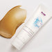 NOW Solutions Joint & Muscle Cream with capsaicin and boswellia 4 oz tube next to cream texture swipe