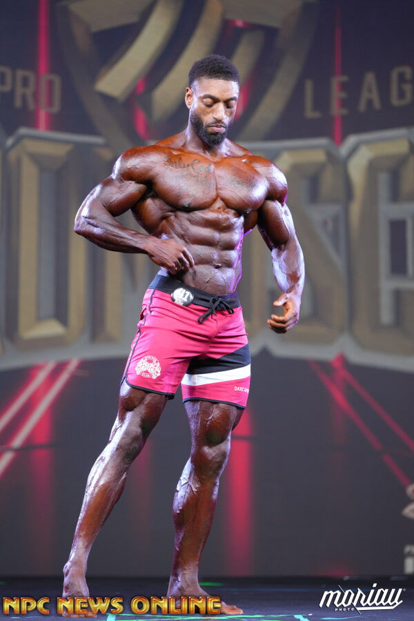Emile Walker onstage at Pro Muscle Italy Pro, 2026