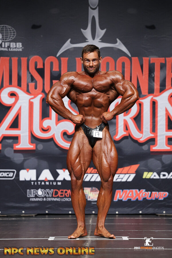 Piotr Wojtowicz onstage at Musclecontest Austria Pro, 2025
