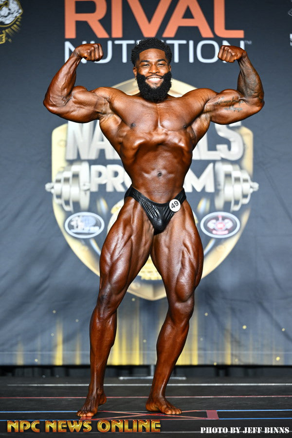 Prosper Nwafor onstage at Ben Weider Natural Pro, 2025